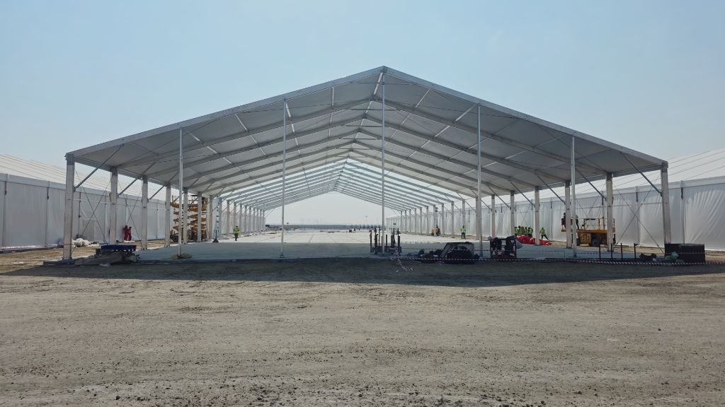 Large span clear roof event tent under construction in the UAE - Mahraj Industries tent solutions